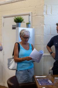 Café Project receiving Charity donation raised by Lavazza Professional team